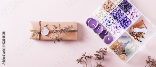 Obraz na płótnie Gift in Kraft Paper with Wax Seal and Making Kit on Pink top view web banner w salonie