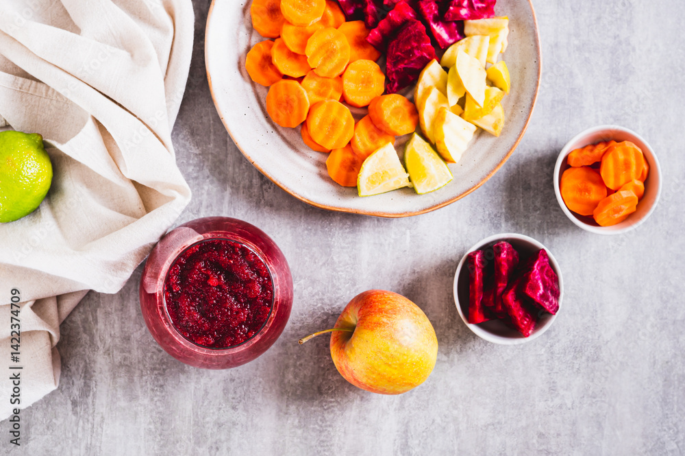 ABC juice from beetroot, carrot and apple for detox in a glass on the table top view