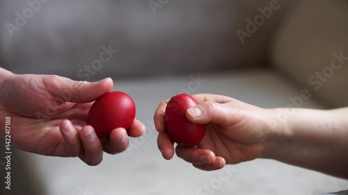 Close up of hands egg tapping