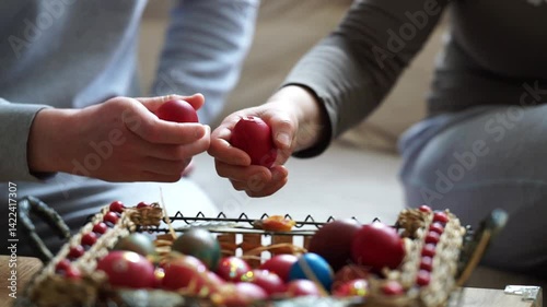 Close up of hands egg tapping