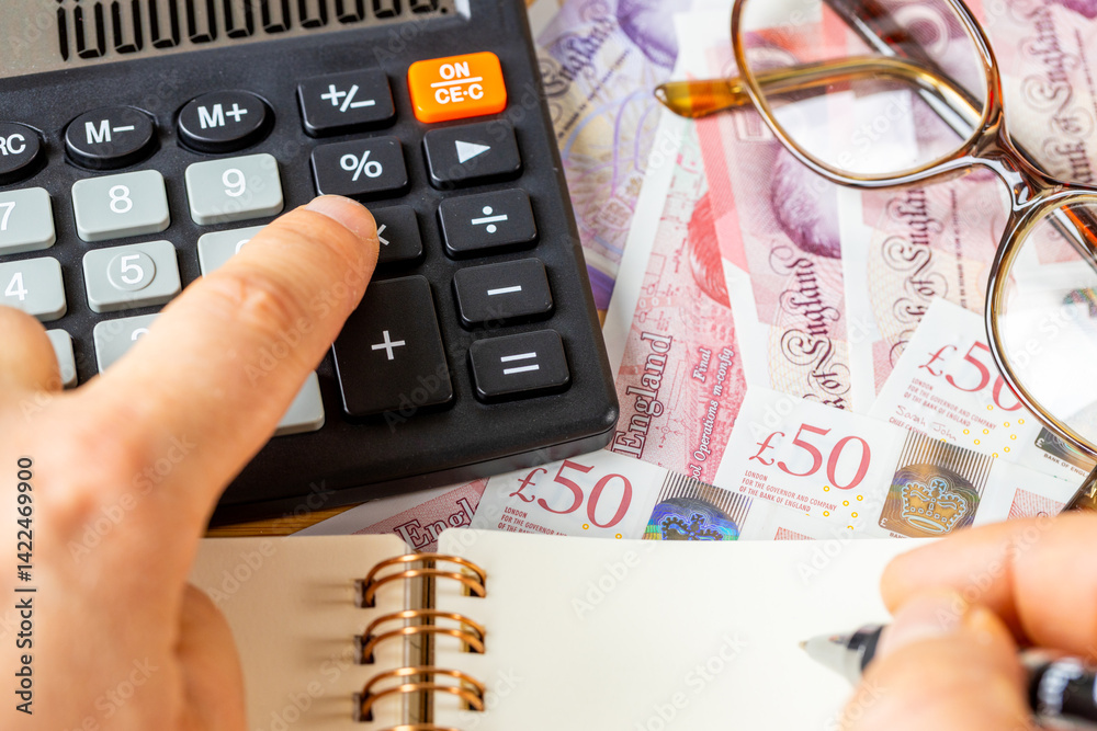 British Pounds, Calculator and Money File, Financial Settlements, Household Budget, Taxes, UK Currency Exchange Rate, Financial Analysis, Economic and Business Concept