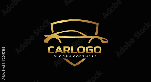 The car logo is gold on a black background...