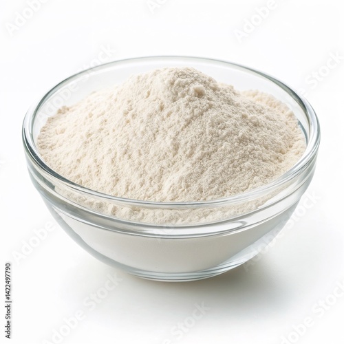Isolated image of baking flour in a glass bowl on a white background