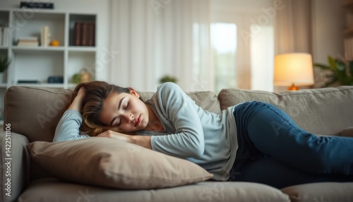 Young woman sleeping on couch (1)
