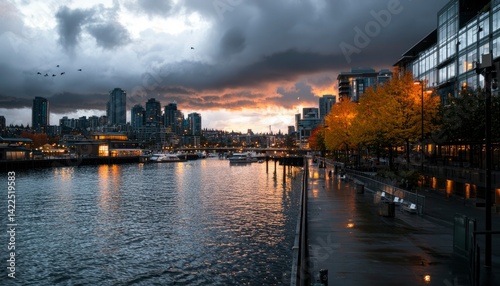 City waterfront at sunset, dramatic sky