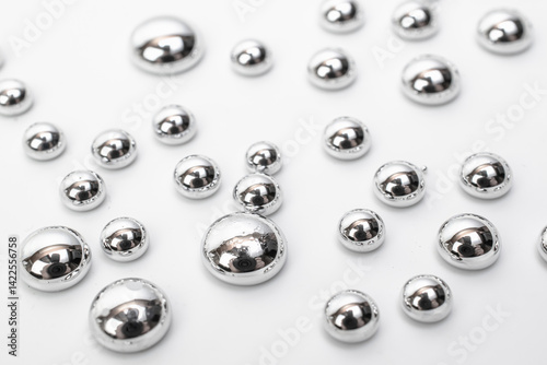mercury metal, drops of metallic liquid mercury