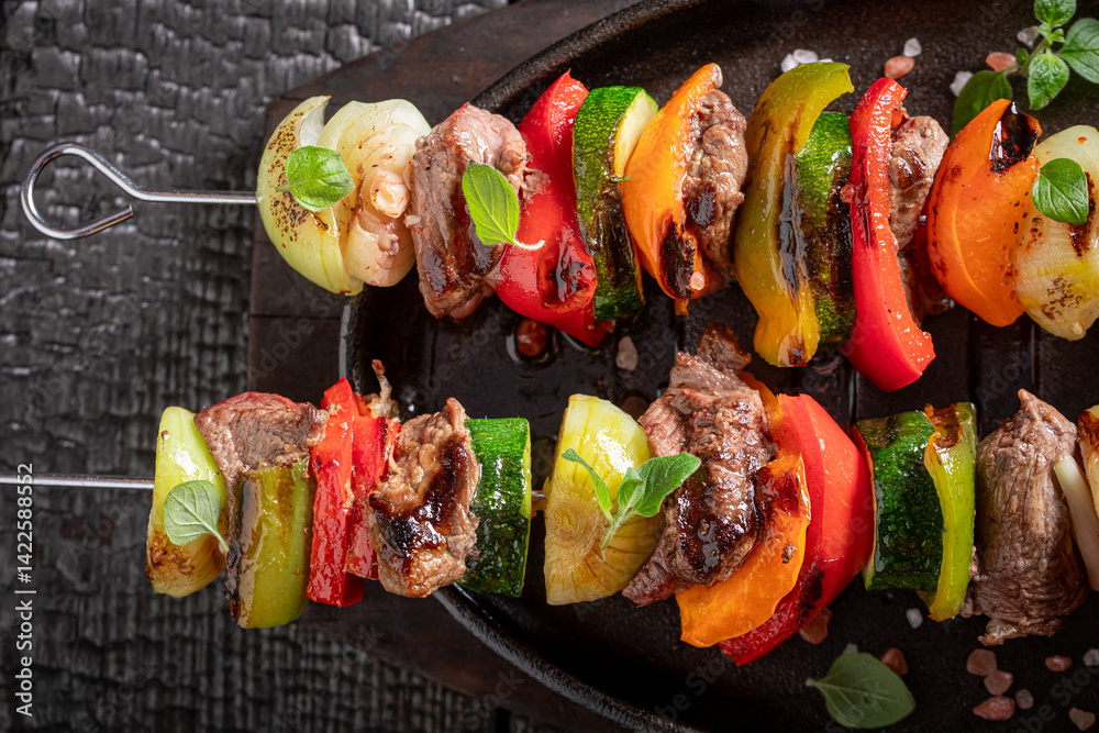 Fresh roasted skewer made of beef and vegetables.
