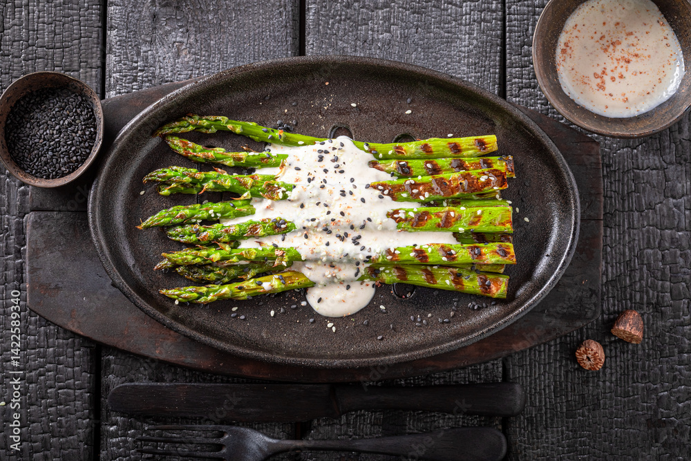 Tasty grilled asparagus as a light summer grilled dish.