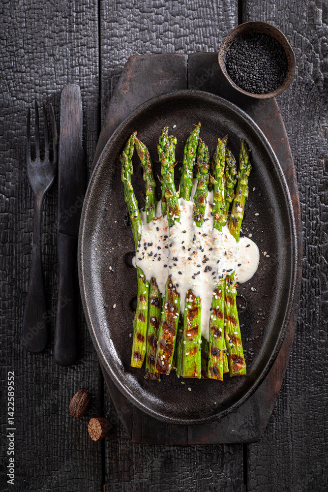 Green roasted asparagus with sesame and lime.