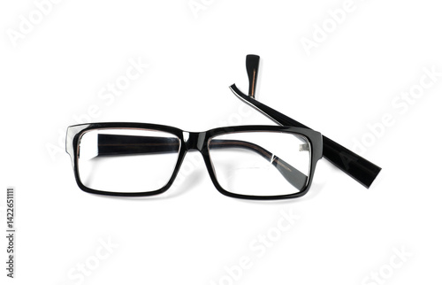 Eyeglasses with broken lens and temple isolated on white, above view