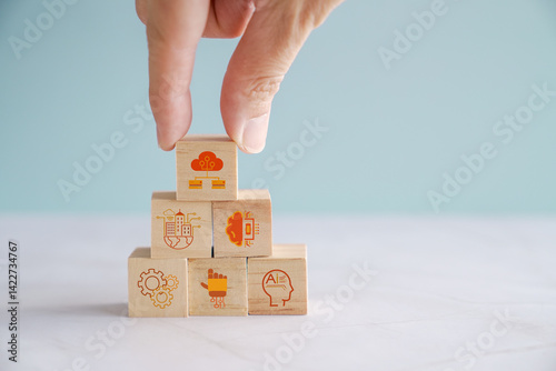 Hands holding IoT, internet of things, ai artificial intelligence icons, future smart city concept

