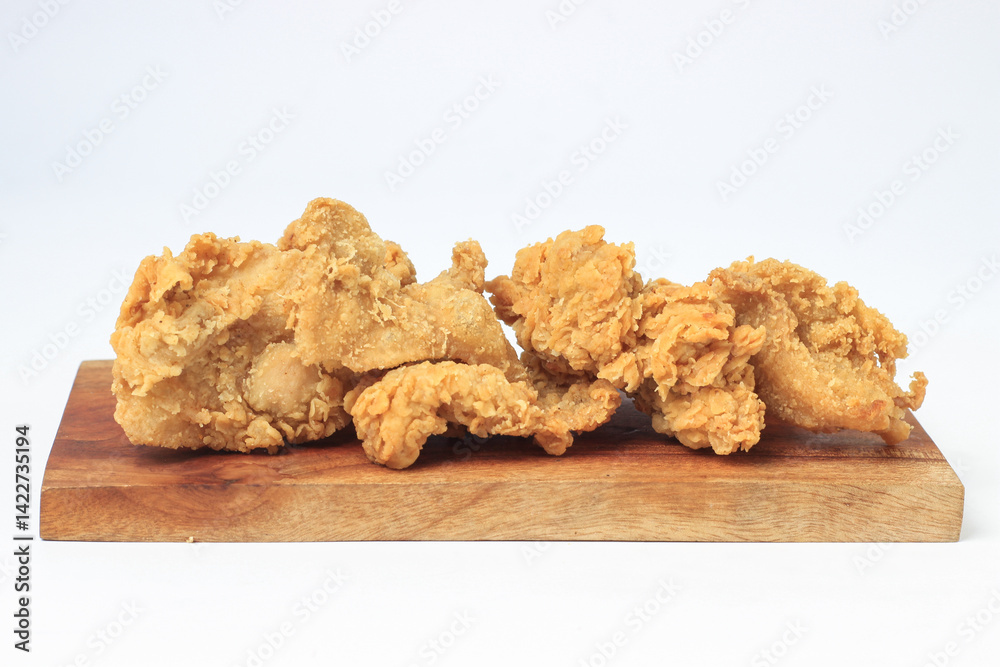crispy chicken skin fried using flour. isolated on white background
crispy chicken skin fried using flour. isolated on white background