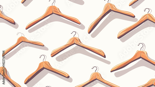 High angle close-up of light brown wooden clothes hangers arranged in a repeating pattern on a bright white background. The hangers are evenly spaced, casting subtle shadows