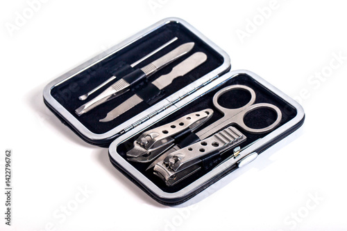 Obraz na płótnie Set of nail care tools for health and beauty in the case isolated on white background. A set of tools for Manicure and pedicure care w salonie