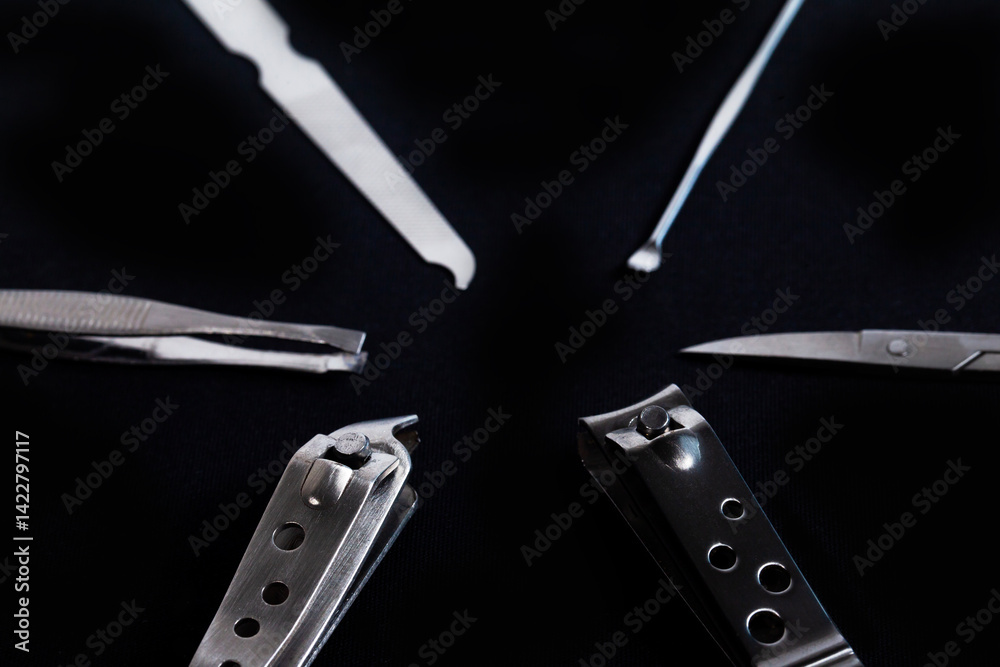 Set of nail care tools for health and beauty isolated on black background. A set of tools for Manicure and pedicure care