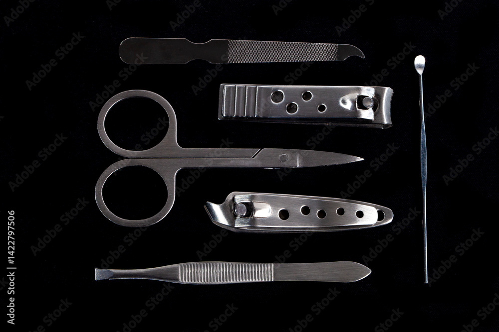 Set of nail care tools for health and beauty isolated on black background. A set of tools for Manicure and pedicure care