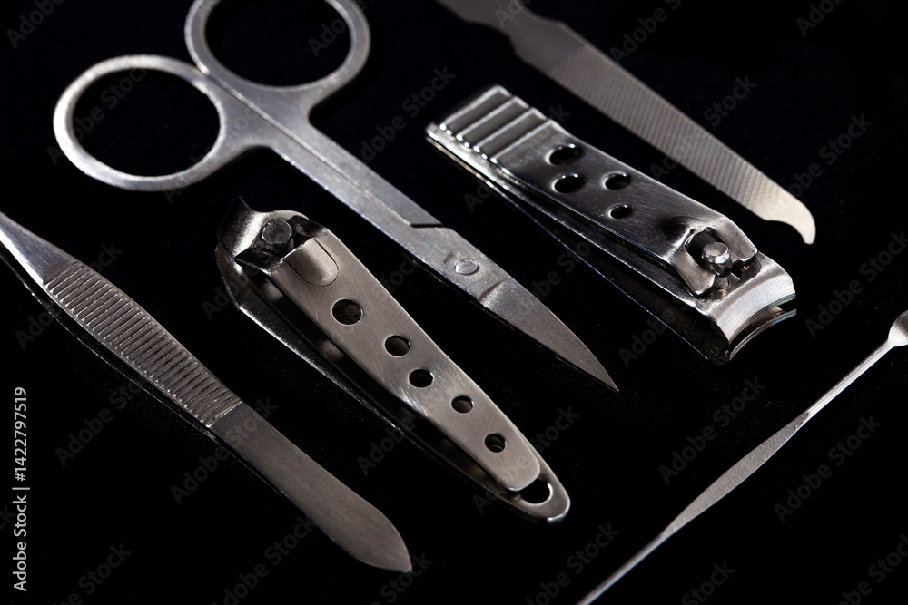 Set of nail care tools for health and beauty isolated on black background. A set of tools for Manicure and pedicure care