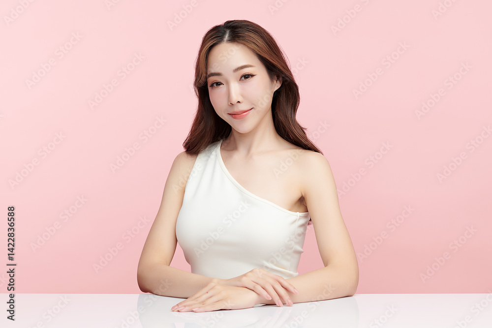 A beautiful young Asian woman with clean, fresh skin against a pink background. Skincare, facial treatment, cosmetology, beauty, and spa. An elegant portrait of an Asian woman. A beautiful young Asian woman with clean, fresh skin against a pink background. Skincare, facial treatment, cosmetology, beauty, and spa. An elegant portrait of an Asian woman.
