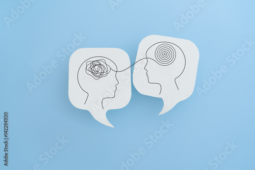 Mental health, brain disorder, World mental health day, Alzheimer, Psychology concept. Human head with Tangle of thoughts and clear line on real white speech bubble paper cut with blue background