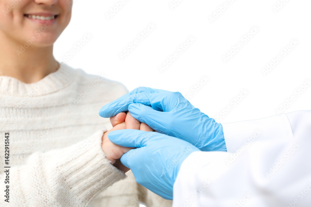 A nurse gently holds a patient's hand, showcasing care and dedication, isolated on white, PNG