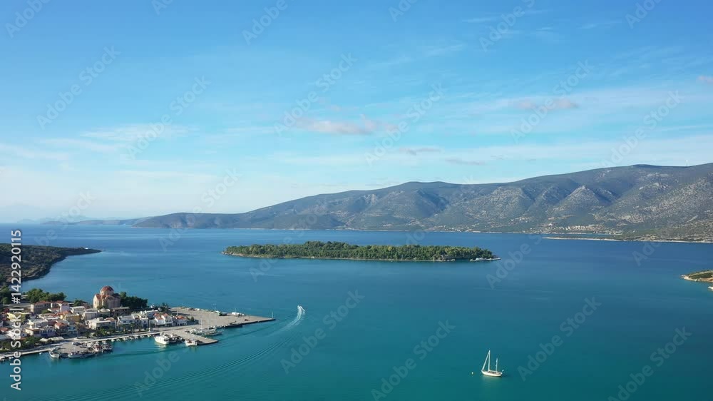 The overview of the port of Kilada in Europe, Greece, Peloponnese, Argolis, in summer, on a sunny day. The overview of the port of Kilada in Europe, Greece, Peloponnese, Argolis, in summer, on a sunny day.