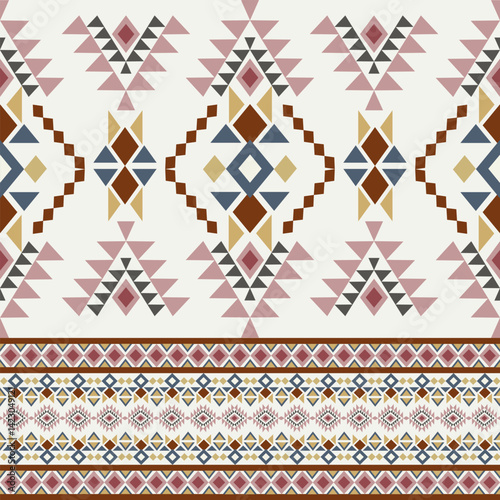 Red, pink, and blue geometric ethnic boho seamless pattern. Traditional ornament. Tribal pattern. Folk motif. Design for wallpaper, elaborate borders, backdrops, tiles, blankets, and textiles.