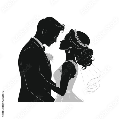 Silhouette of groom gently kissing bride’s forehead