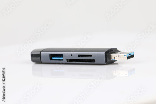 Usb multi-card reader and flash drive home office product photography clean background side view tech convenience