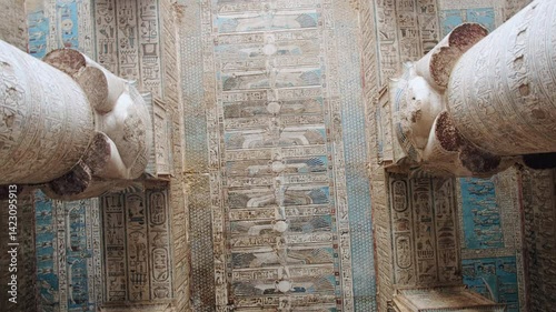 Ceiling of Hypostyle Hall decorated with hieroglyphics and ancient egyptian theme pictures. Temple of Hathor. Dendera Temple complex, Qena, Egypt