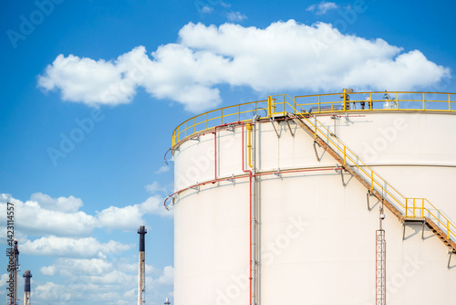 Obraz na płótnie Oil storage tank at oil and gas refinery industrial zone, Business industrial storage tank oil and gas refinery, Crude oil storage tank business logistic and transportation, w salonie