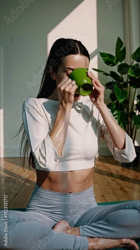 Peaceful woman sipping matcha