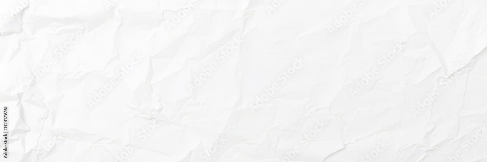 Fototapeta premium Crumpled white paper with visible creases and wrinkles on a flat surface, minimalist, wrinkled