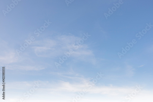 Fototapeta Naklejka Na Ścianę i Meble -  Sky vivid cyan white cirrus clouds soft gradient beauty spring bright blue sky fluffy clouds calm background sunshine light landscape gloomy weather gradient fade clear view horizon nature light wide.