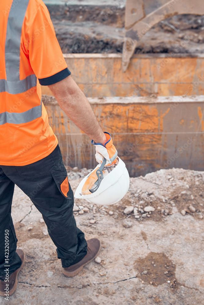 Construction worker working on a public city road reconstruction
