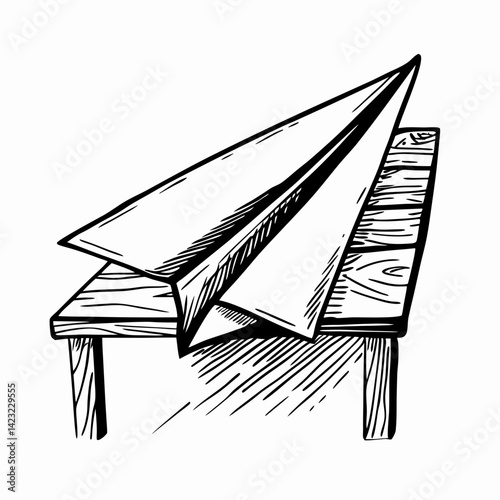 Paper airplane rests on a wooden table evoking nostalgia and creativity in a simple artistic sketch style representing playful imagination and childhood.
