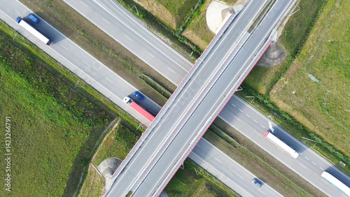 view of white semi-truck driving on countryside highway