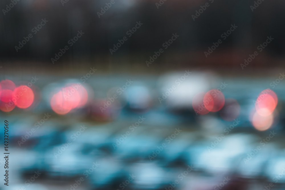 Blurry image of bustling city at dusk