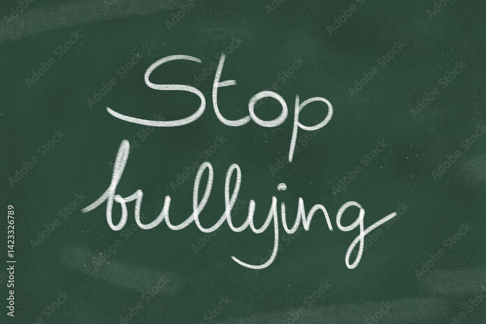 Obraz premium Stop bullying written with chalk on a green chalkboard