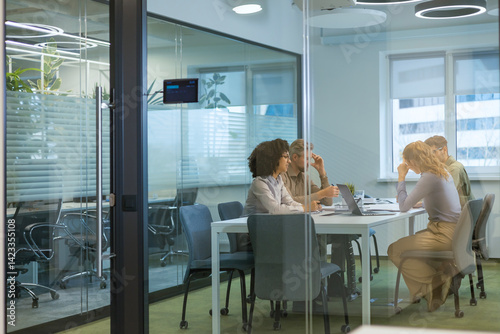 Business office with blurred people casual wear, with blurred bokeh background