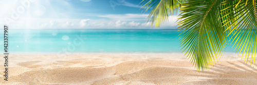 Obraz na płótnie Beautiful wide panorama of a tropic paradise summer beach with white sand and palm leaves. Natural landscape. w salonie