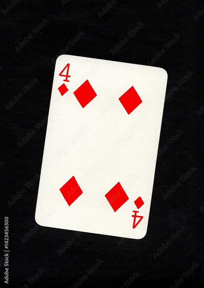 Obraz premium Playing card in the suit of diamonds isolated on a black background.