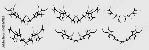 Set of tribal black tattoo patterns. Gothic Y2K sharp decorative elements. Vector abstract symmetrical shapes.