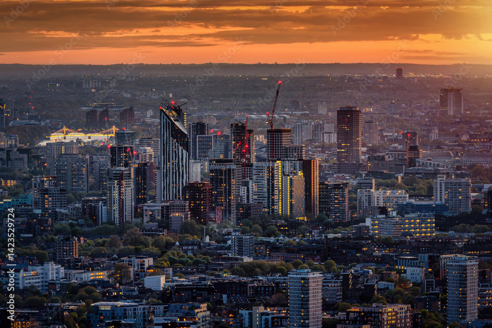 Elevated view of the London skyline with Elephant and Castle and Chelsea district in the background during sunset time