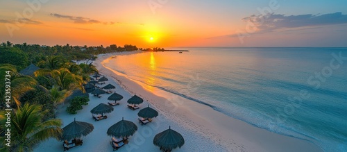 Tropical beach sunset, ocean view, resort photo