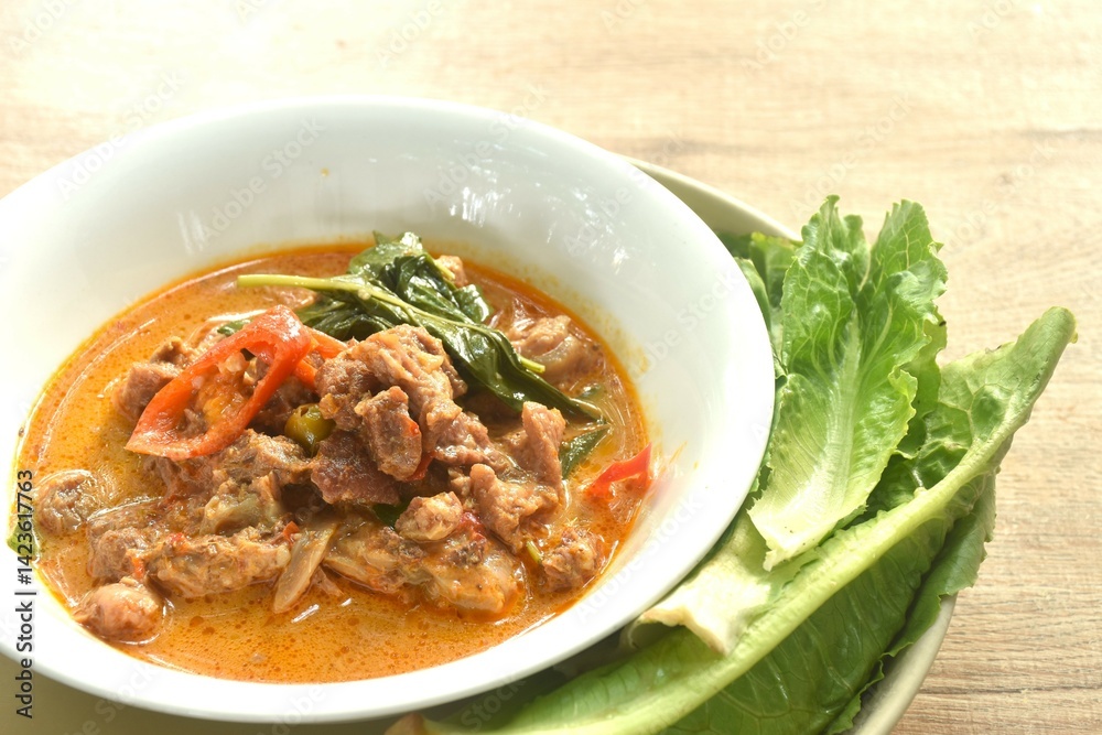 spicy boiled beef meat with eggplant in coconut milk red curry soup on bowl eat couple fresh cos vegetable spicy boiled beef meat with eggplant in coconut milk red curry soup on bowl eat couple fresh cos vegetable