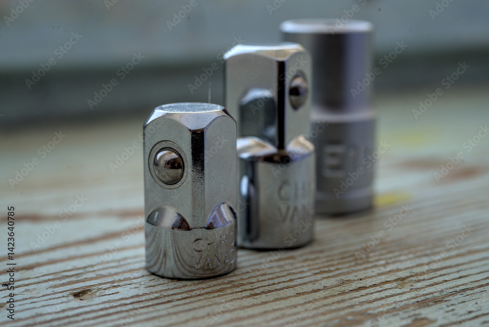 Photo of socket adapters on the wood