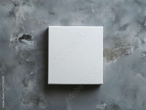 White Square Box On A Textured Gray Concrete Surface Top View