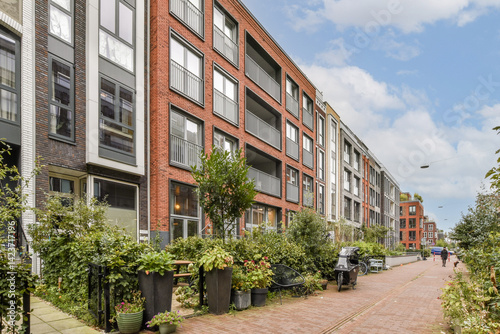 Contemporary residential buildings showcase sleek designs and harmonious layouts, surrounded by lush greenery and walkable paths, emphasizing urban living.