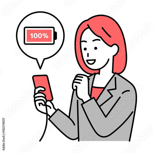 スマートフォンを充電するスーツの女性