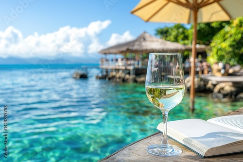 Wallpaper Mural Wine reading poolside relaxation Relaxing view with a glass of water by a serene seaside setting. Torontodigital.ca